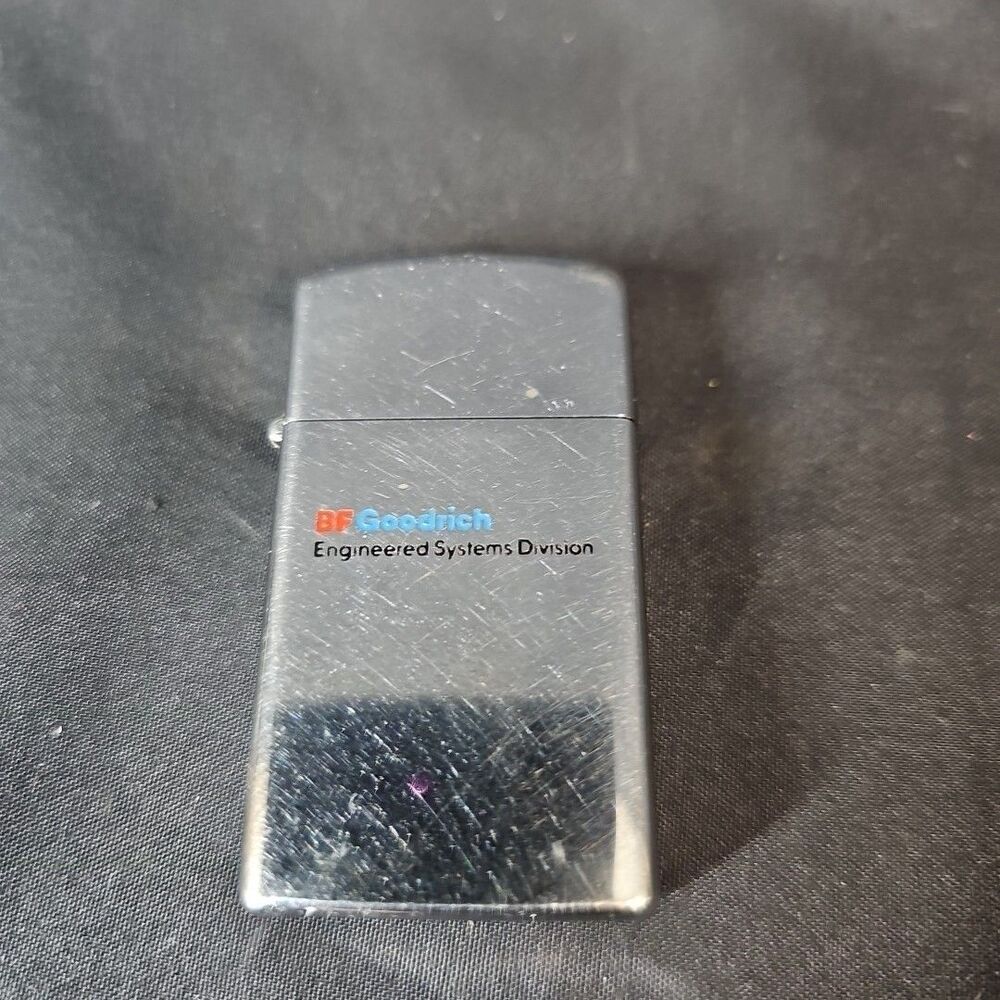 VINTAGE BF GOODRICH INTERNATIONAL DIVISION SLIM ZIPPO LIGHTER